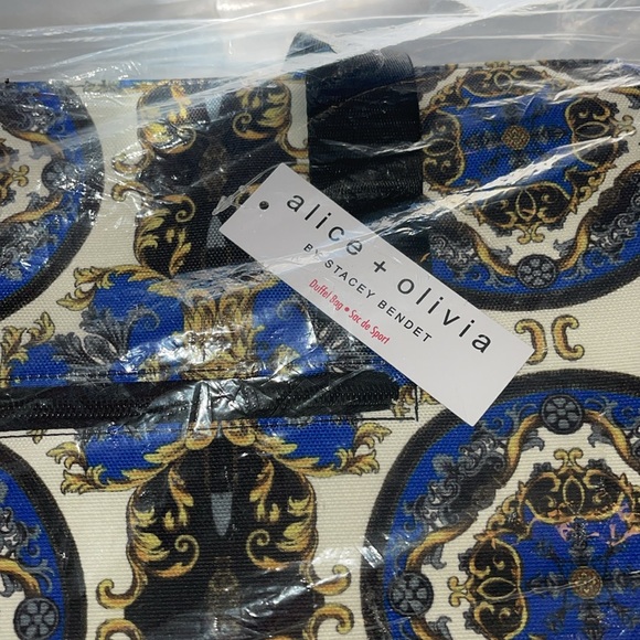 NWT- Alice + Olive weekender bag. Blue canvas printed with gold hardware. - Picture 5 of 5